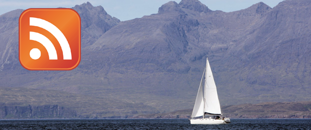 Image of a yacht sailing in front of the Black Cuillin Hills on the Isle of Skye, with inset RSS logo